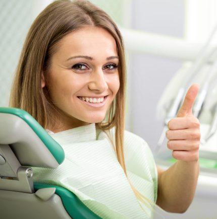 girl_in_dental_chair_thumb_up